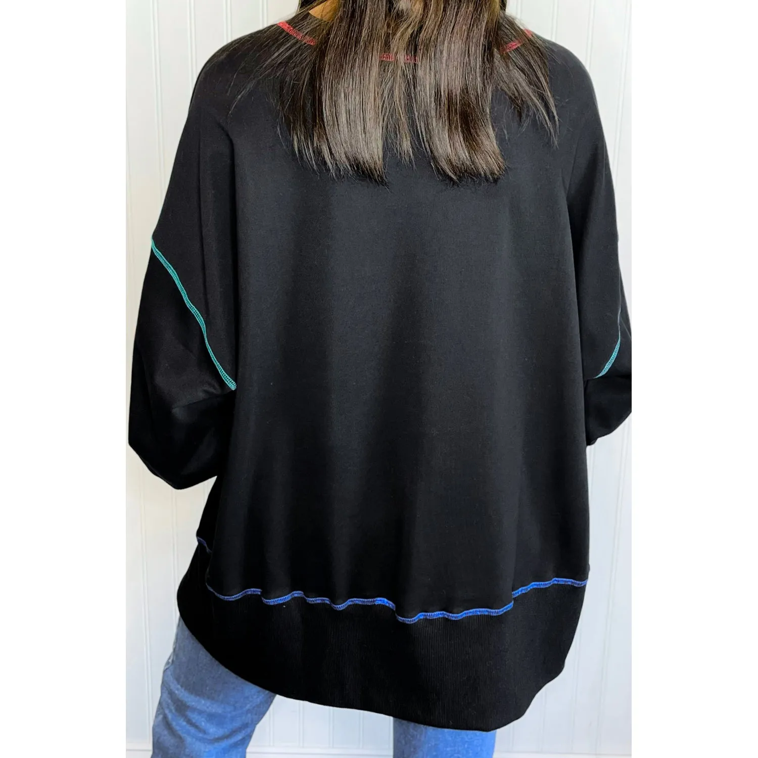 Black Sequin Clover Exposed Seam Split Lantern Sleeve Sweatshirt